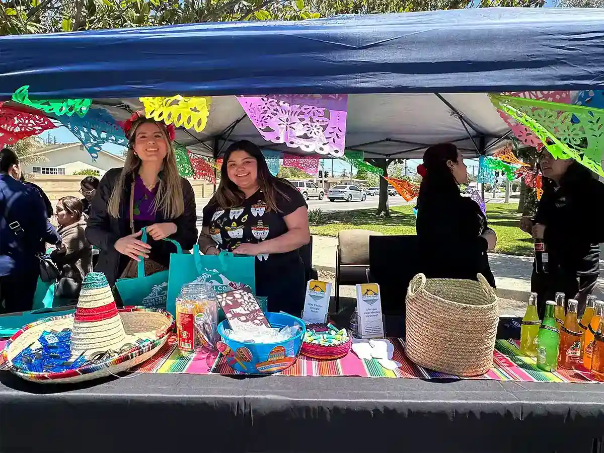 Team at outdoor event booth